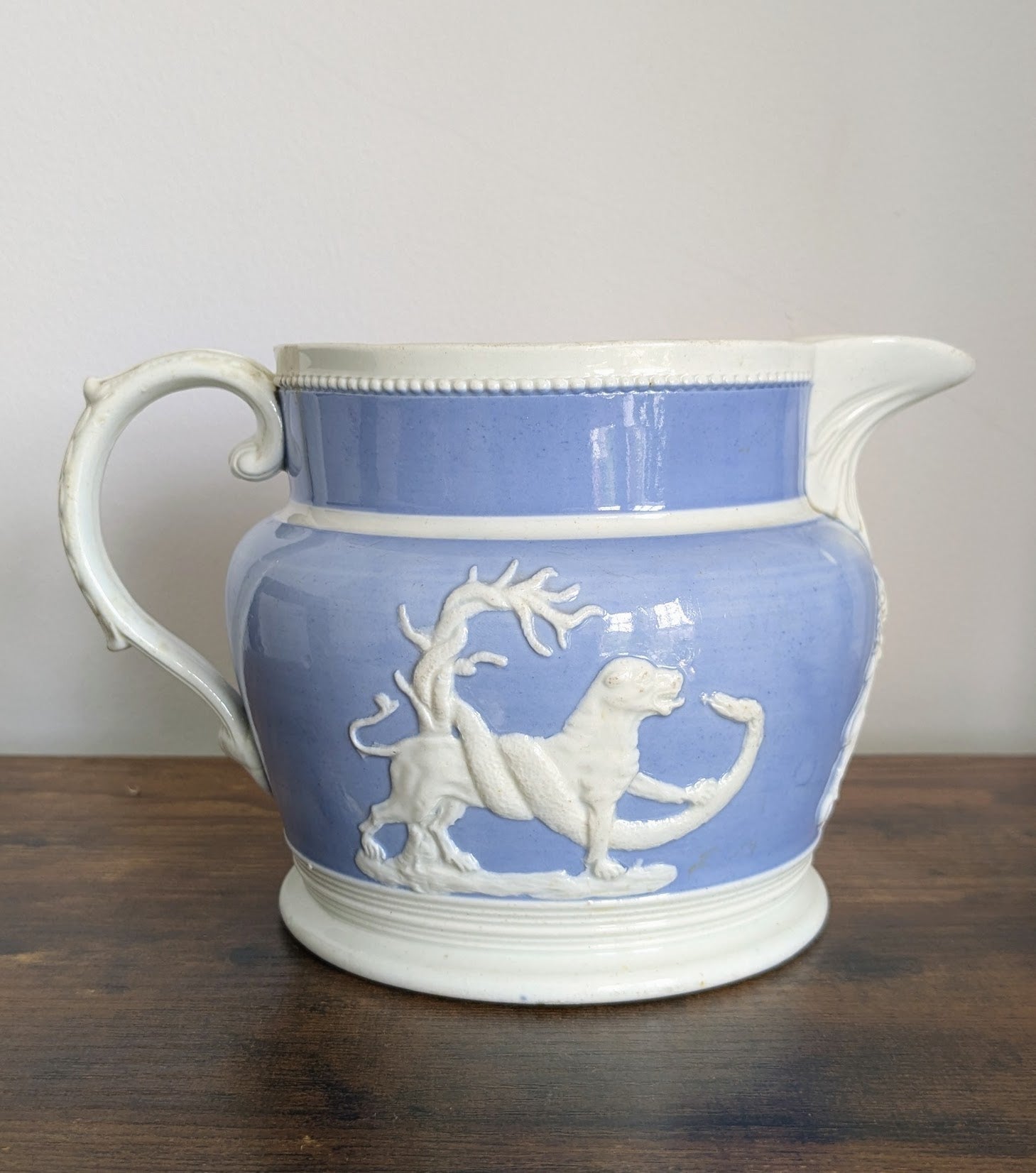British Lions Snake & Armorial Molded Blue Glazed Jug Chetham and Woolley - early 19th century