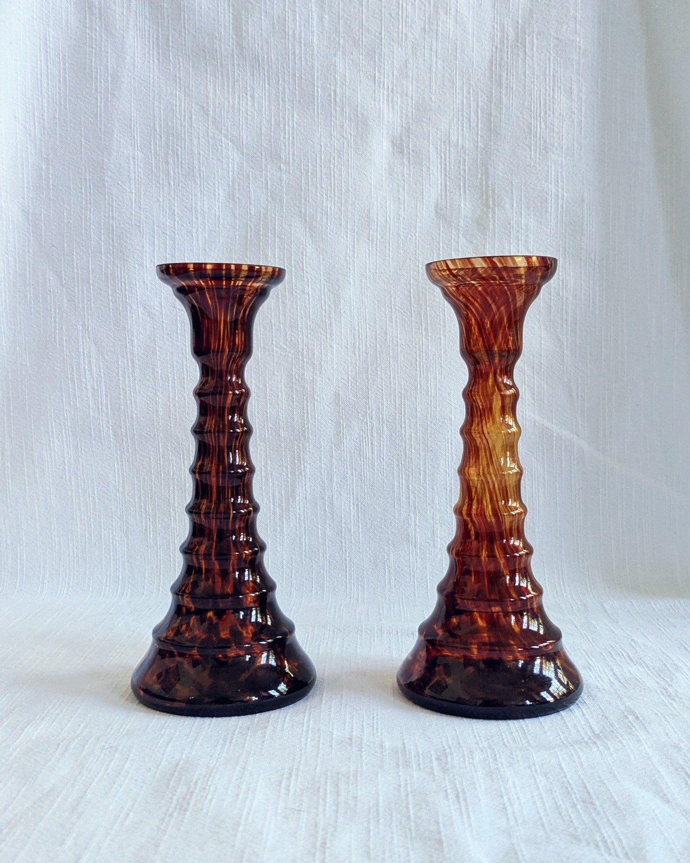 Pair of Art Deco Tortoiseshell pattern Glass Candlesticks, c.1930