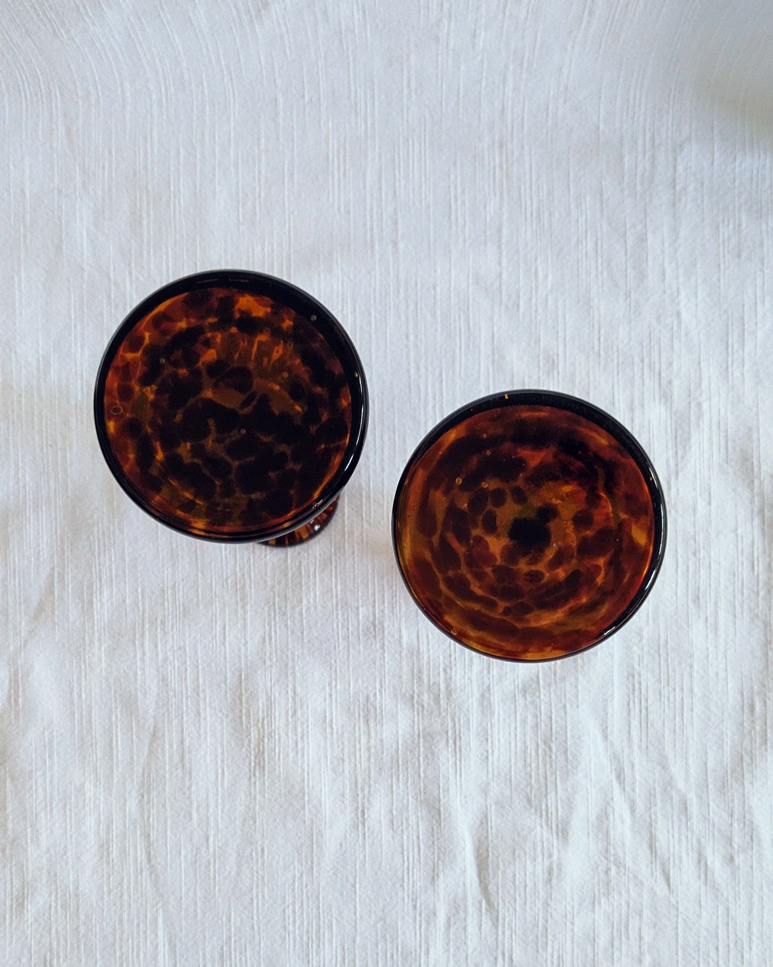 Pair of Art Deco Tortoiseshell pattern Glass Candlesticks, c.1930