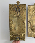Pair of antique Swedish brass wall candle sconces with floral decoration and winged cherubs