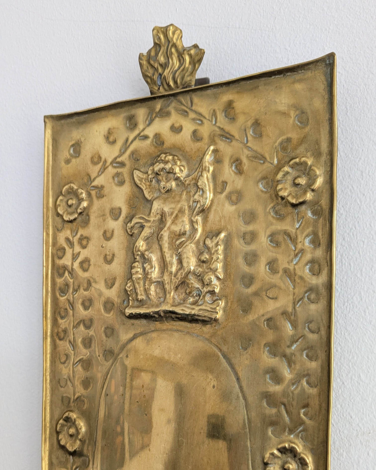 Pair of antique Swedish brass wall candle sconces with floral decoration and winged cherubs