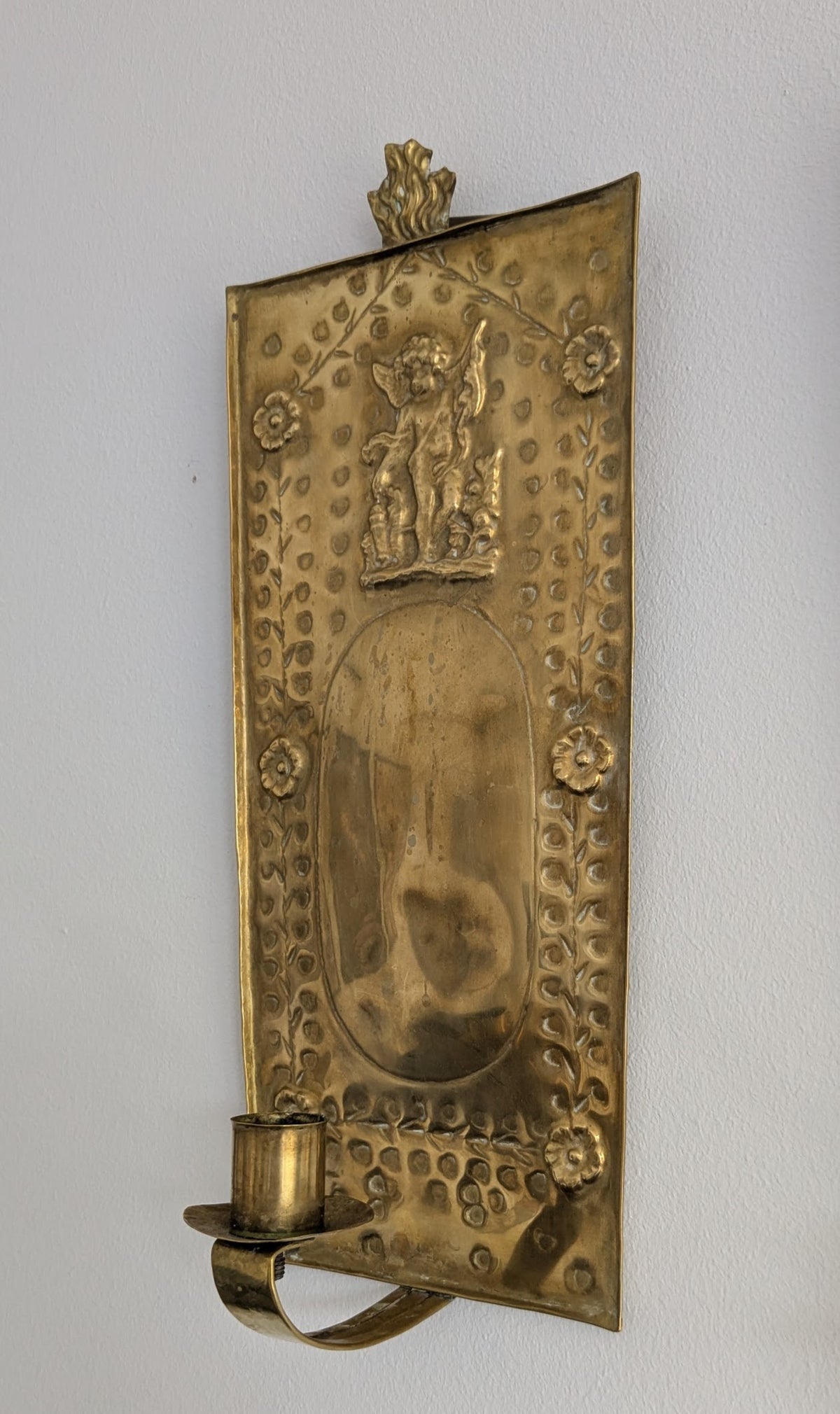 Pair of antique Swedish brass wall candle sconces with floral decoration and winged cherubs