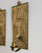 Pair of antique Swedish brass wall candle sconces with floral decoration and winged cherubs