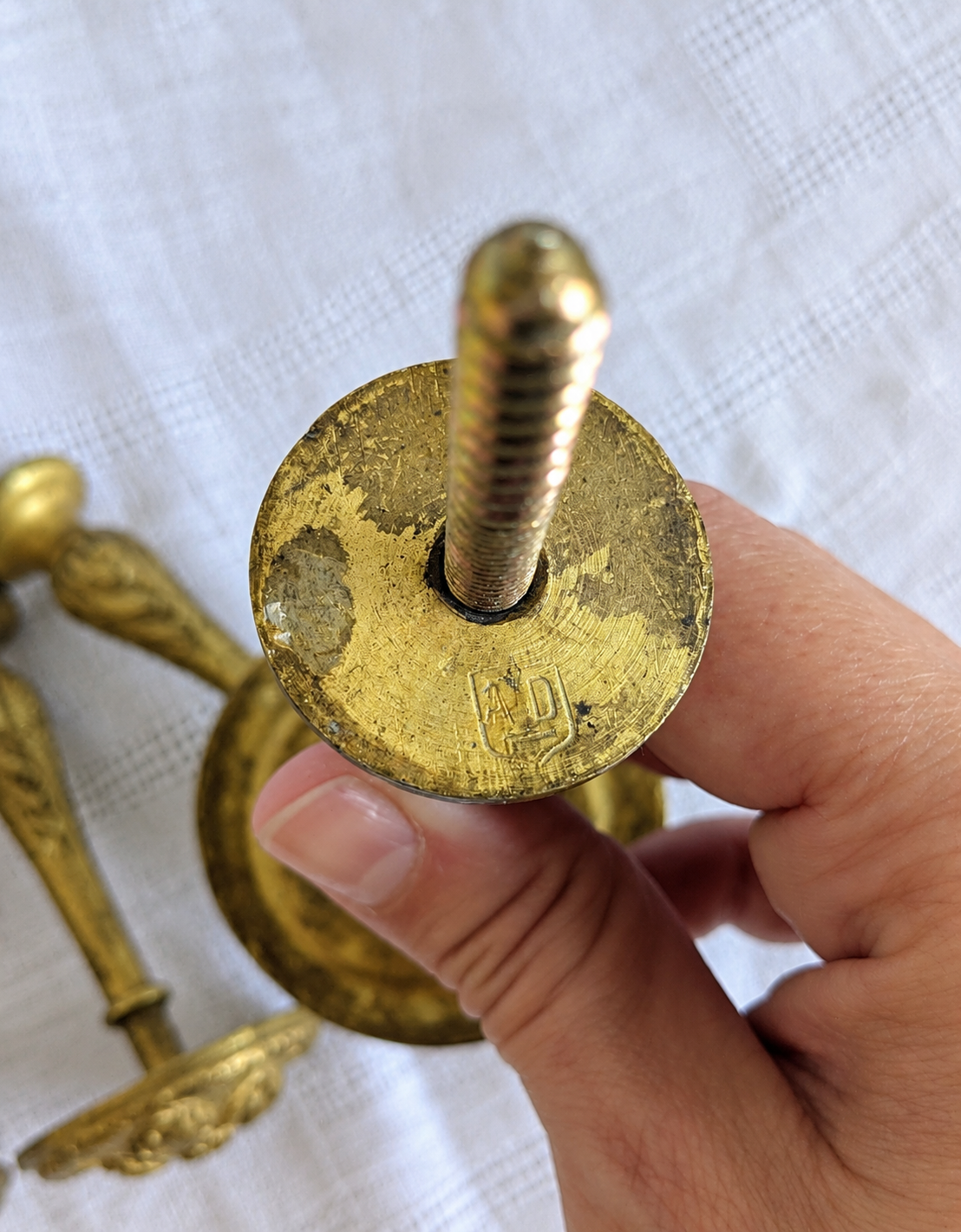 Back view of antique French gilt bronze curtain tieback hook