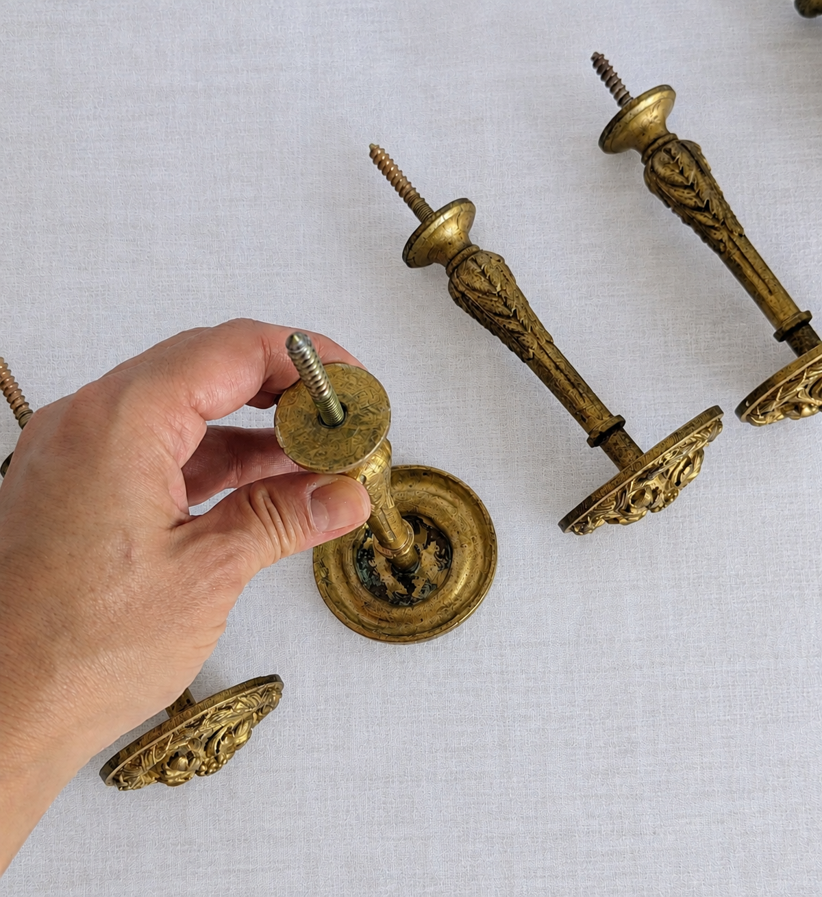 Aged gilt bronze patina on 19th-century French curtain tieback