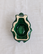 Rear view of vintage French ceramic frog advertising ashtray