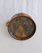 Curved copper handle on antique Victorian haystack measure