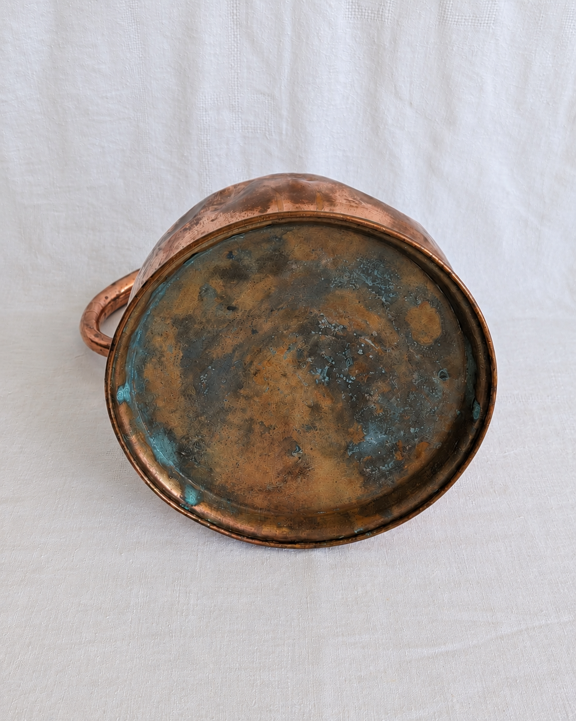 Curved copper handle on antique Victorian haystack measure