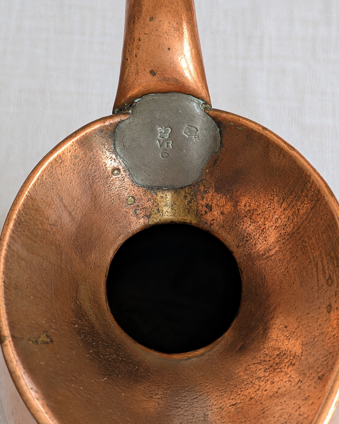 Crown and VR verification stamp on Victorian copper haystack measure