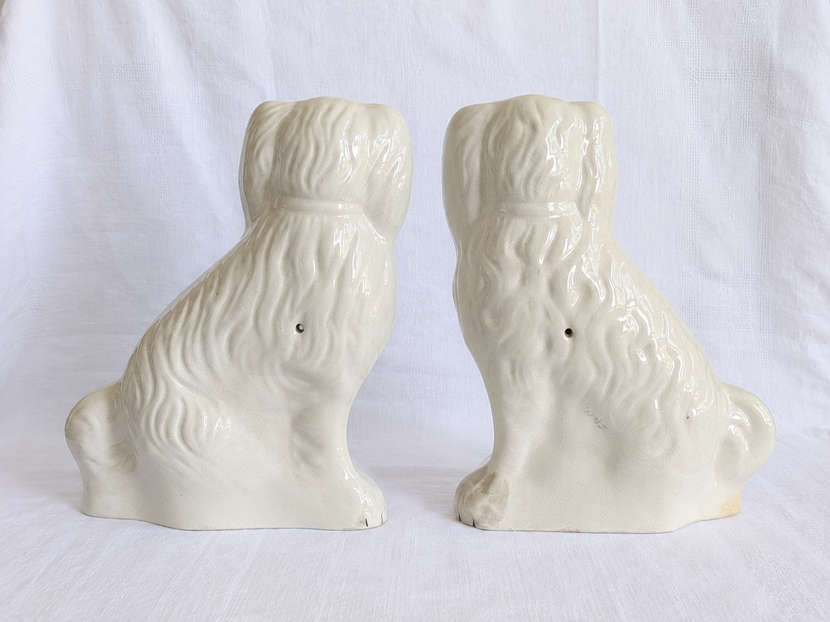 Back of Victorian Staffordshire Wally Dog showing original firing hole